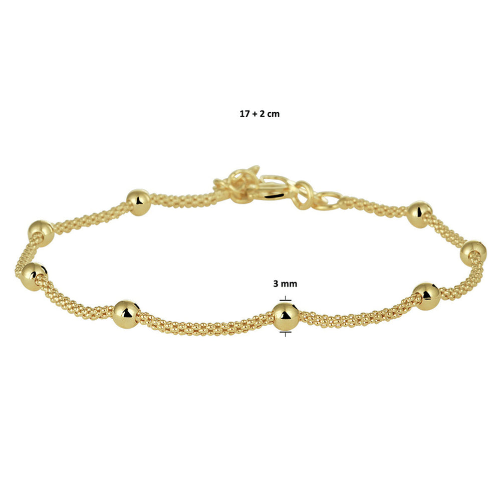 De Van der Kooij Collectie armband bolletjes 3,0 mm 17 + 2 cm is een zilver verguld sieraad in geel, voorzien van een dubbele ketting en gelijkmatig verdeelde bolletjes voor een minimalistisch en elegant design.
