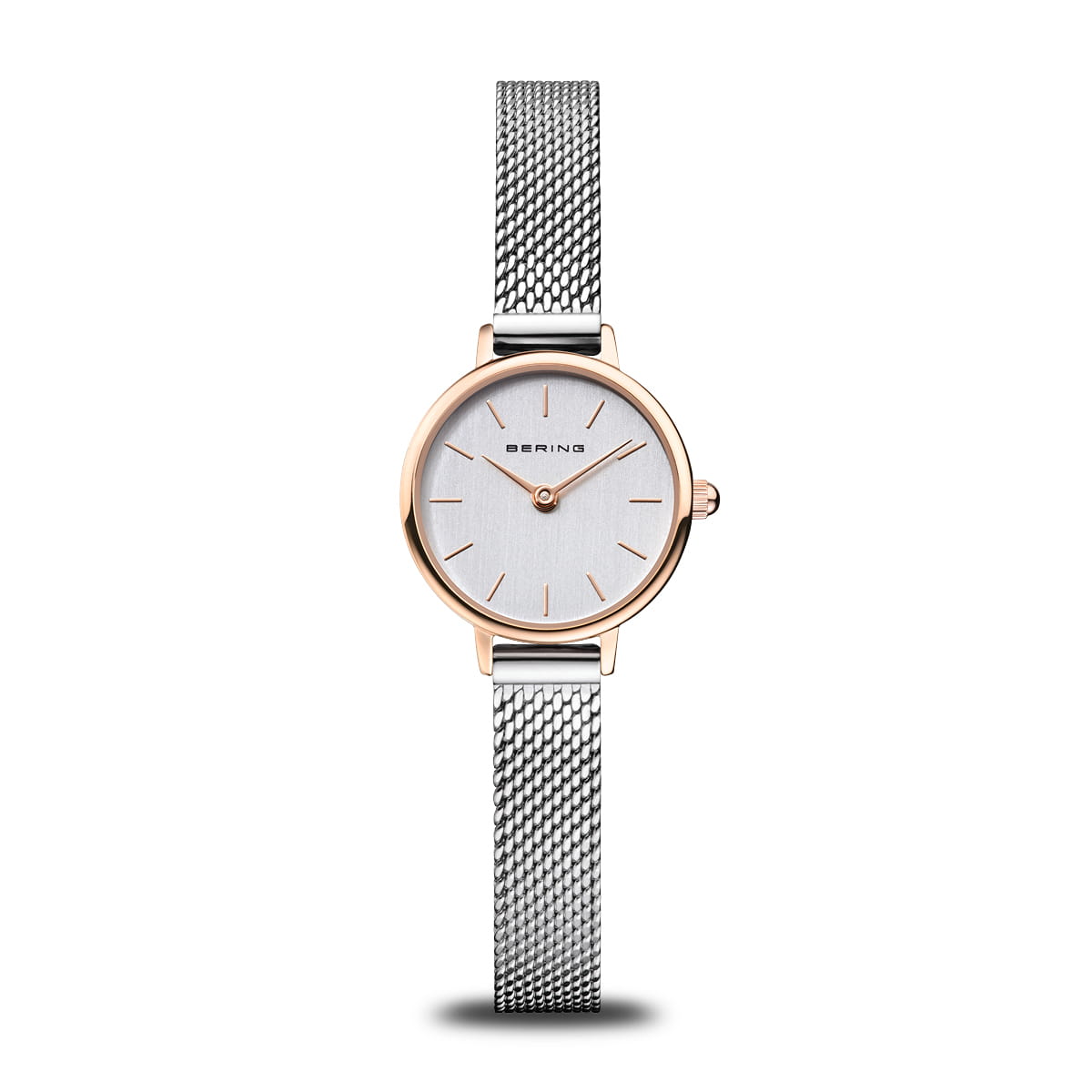 Orologio da donna con quadrante argentato, cassa rotonda in oro rosa e cinturino in maglia rolò argentata.