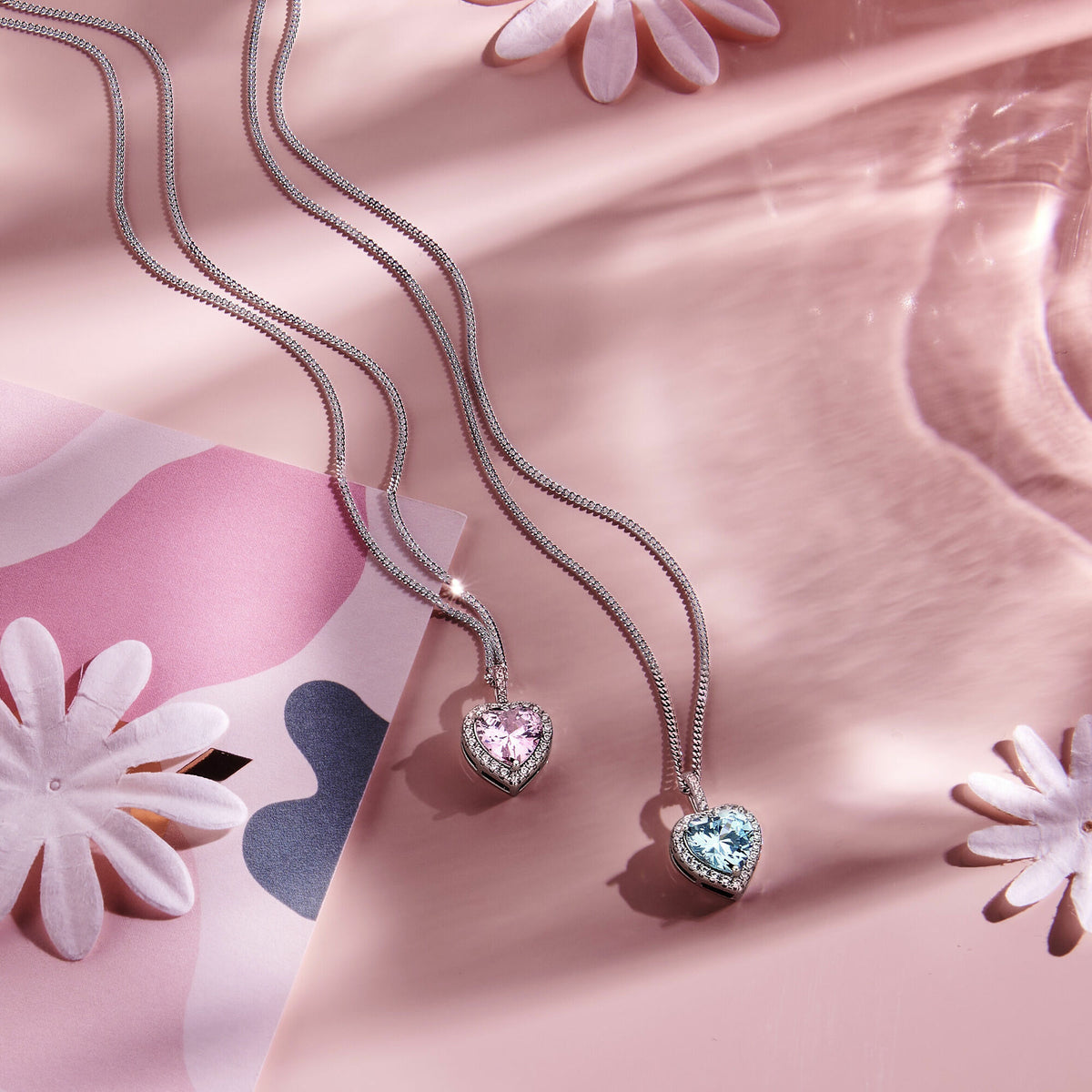 ciondolo cuore zircone bianco e color acquamarina halo argento rodiato
