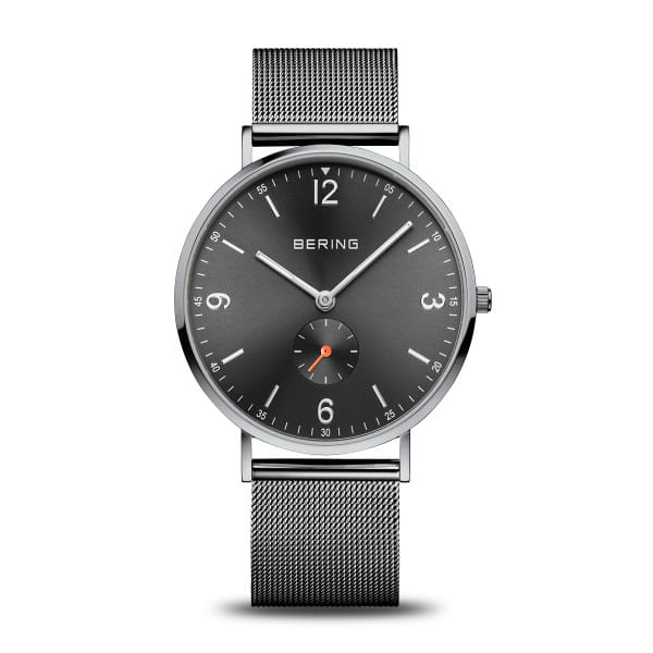 Orologio da uomo Bering con quadrante grigio, cassa in acciaio e cinturino in maglia rolò.