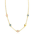 Collana dorata con pietre colorate, composta da una catena fine e dettagli rotondi.