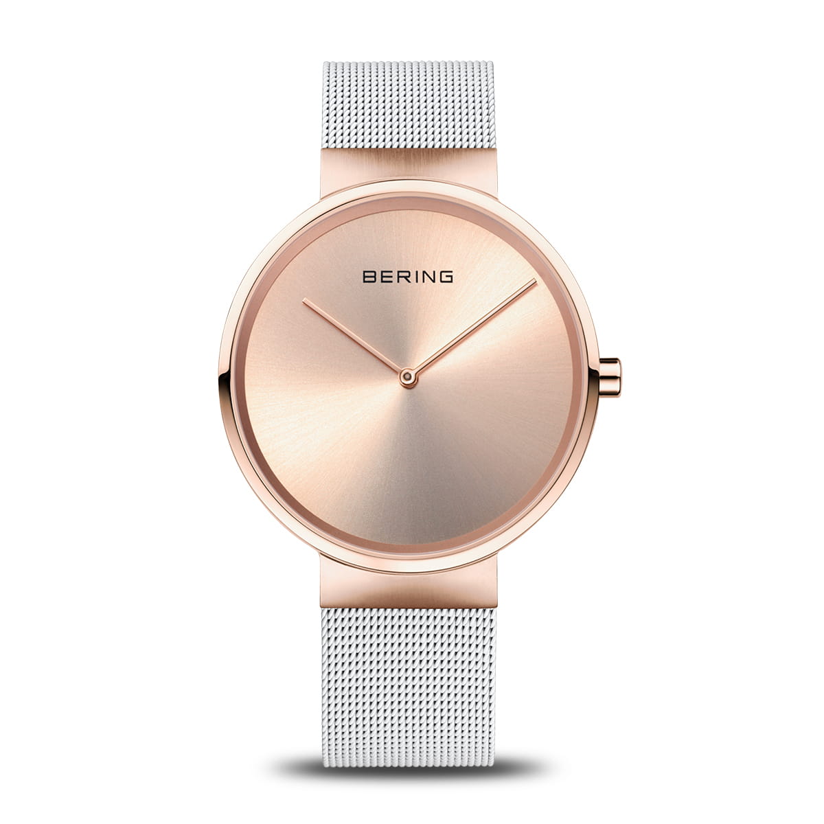 Orologio con cassa rotonda in oro rosa e cinturino in maglia rolò argentata.