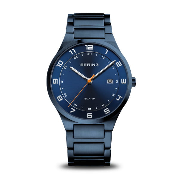 Orologio Bering con cassa blu e cinturino in acciaio, quadrante blu con dettagli arancioni.