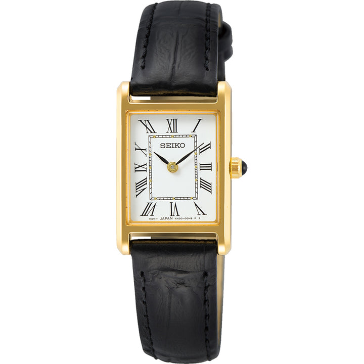 Het Seiko Dames Horloge SWR054P1 heeft een rechthoekige gouden kast, een witte wijzerplaat met zwarte Romeinse cijfers, zwarte wijzers en een zwarte leren band met zichtbare stiksels. Dit elegante kwartshorloge combineert klassieke stijl en betrouwbaarheid.