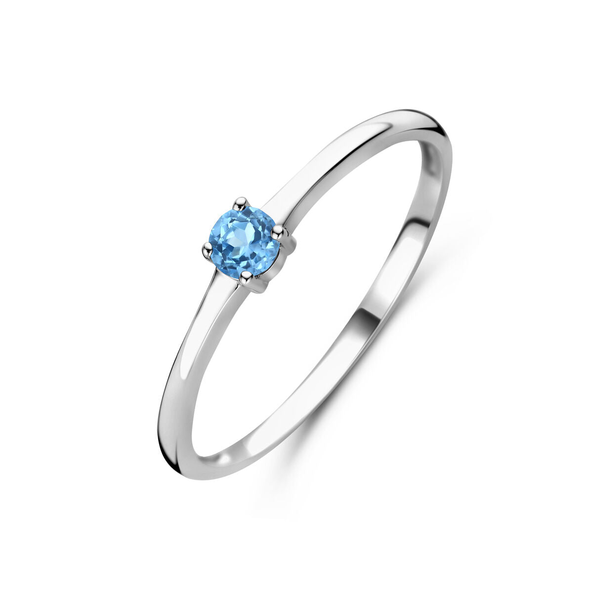 Anello in argento rodiato con pietra di nascita topazio blu di dicembre.