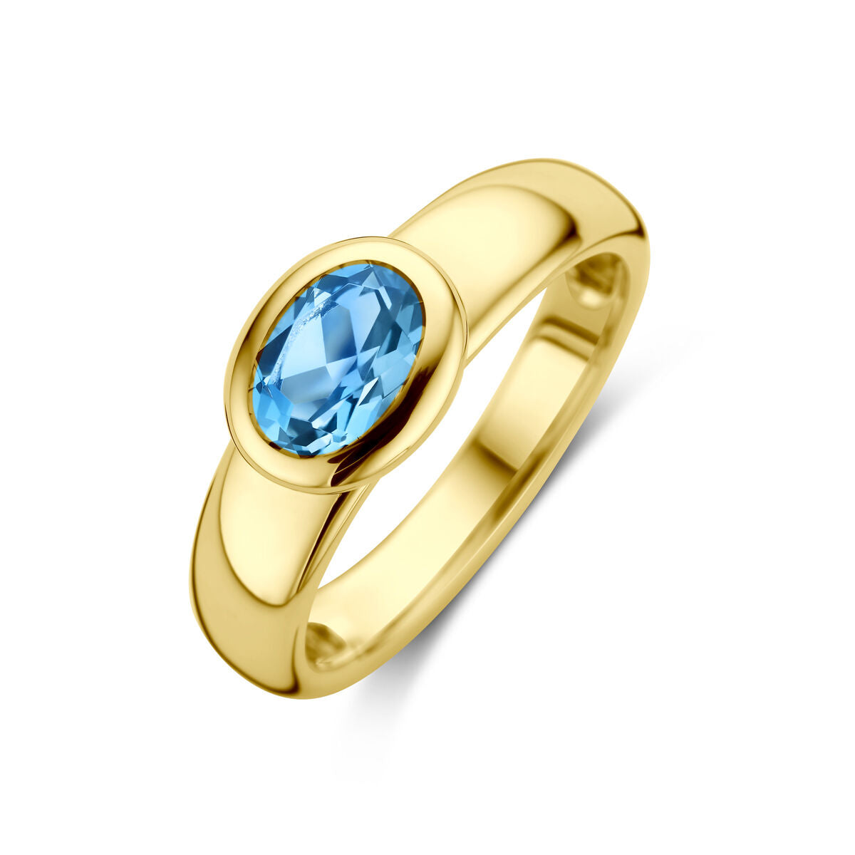 Anello in oro giallo 14K con topazio blu di Londra ovale al centro.