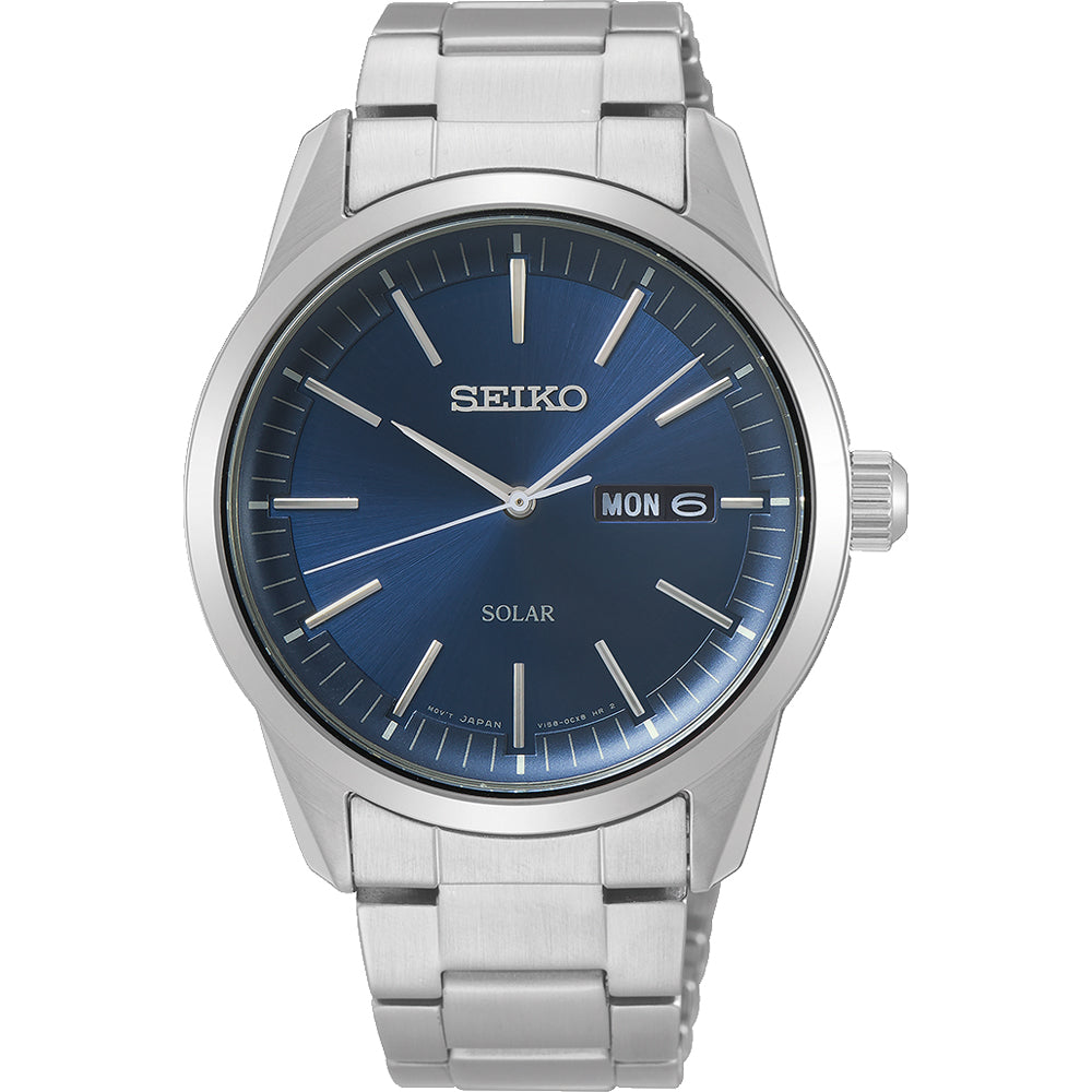 Ontdek het Seiko heren horloge SNE525P1, een op zonne-energie werkende edelsteen met een zilveren metalen band en een diepblauwe wijzerplaat. Het beschikt over saffierglas bescherming, zilveren markeringen en wijzers, dag-datumweergave met maandag 6 en Solar boven 6 uur - een waar meesterwerk van elegantie.