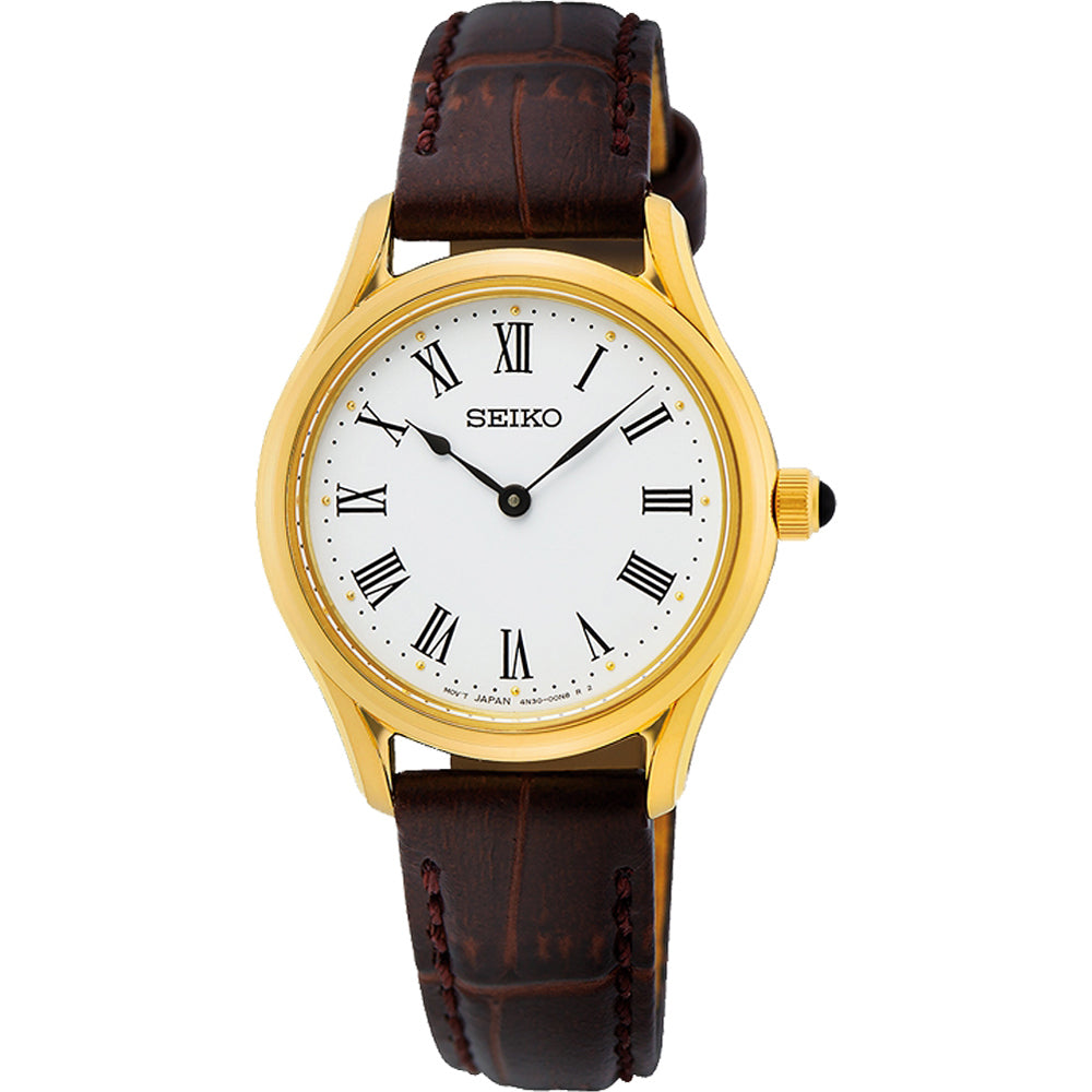 Orologio da donna Seiko con cassa dorata, quadrante bianco e cinturino in pelle marrone.