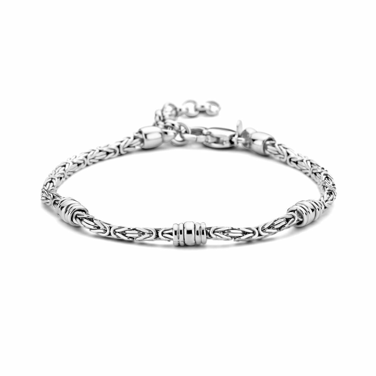 Bracciale in argento rodiato con maglia bizantina e anelli decorativi, lunghezza 18 + 3 cm.