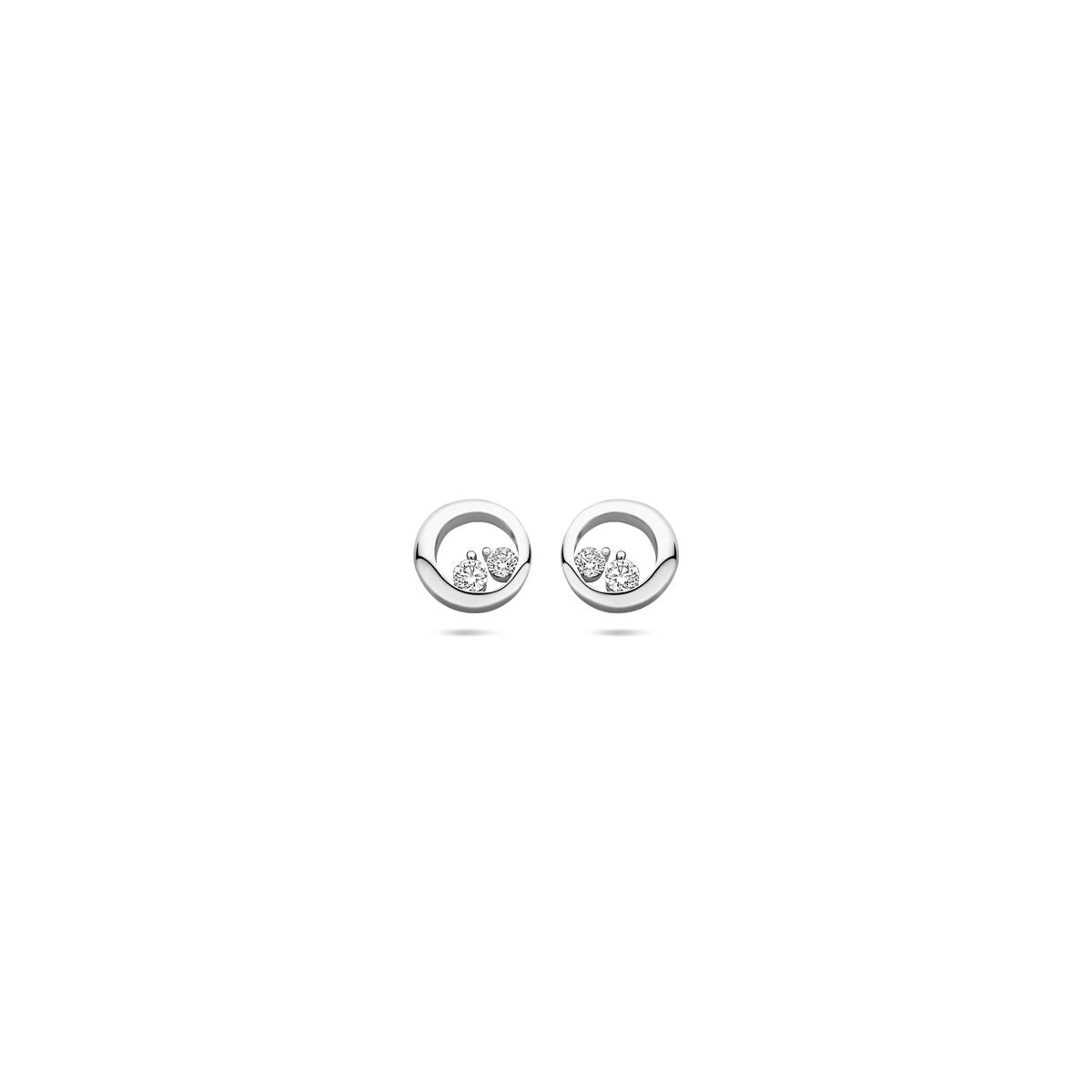 Orecchini in argento rodiato con zirconi, diametro di 7 mm.
