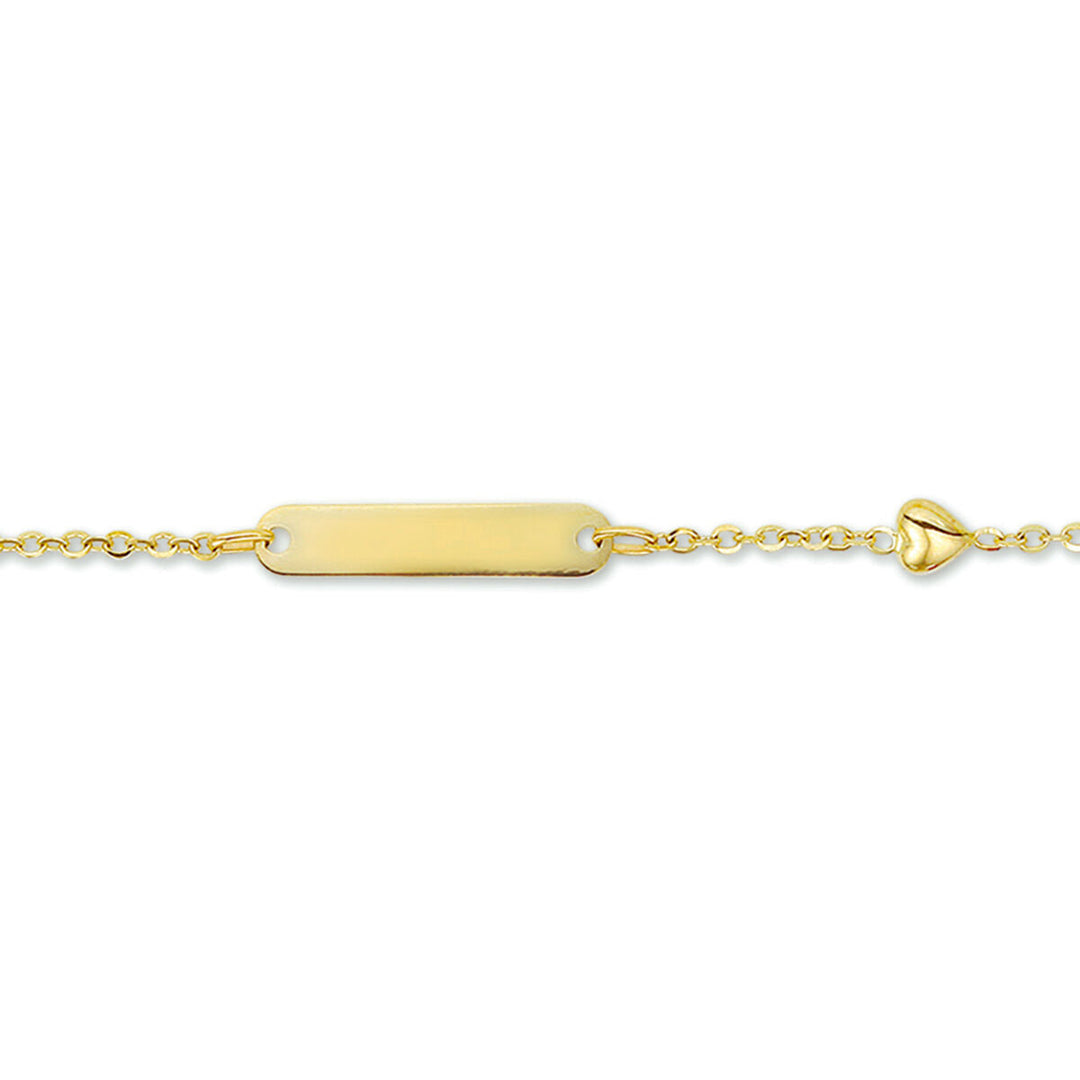 Bracciale in oro con placca rettangolare per incisione e cuore decorativo.