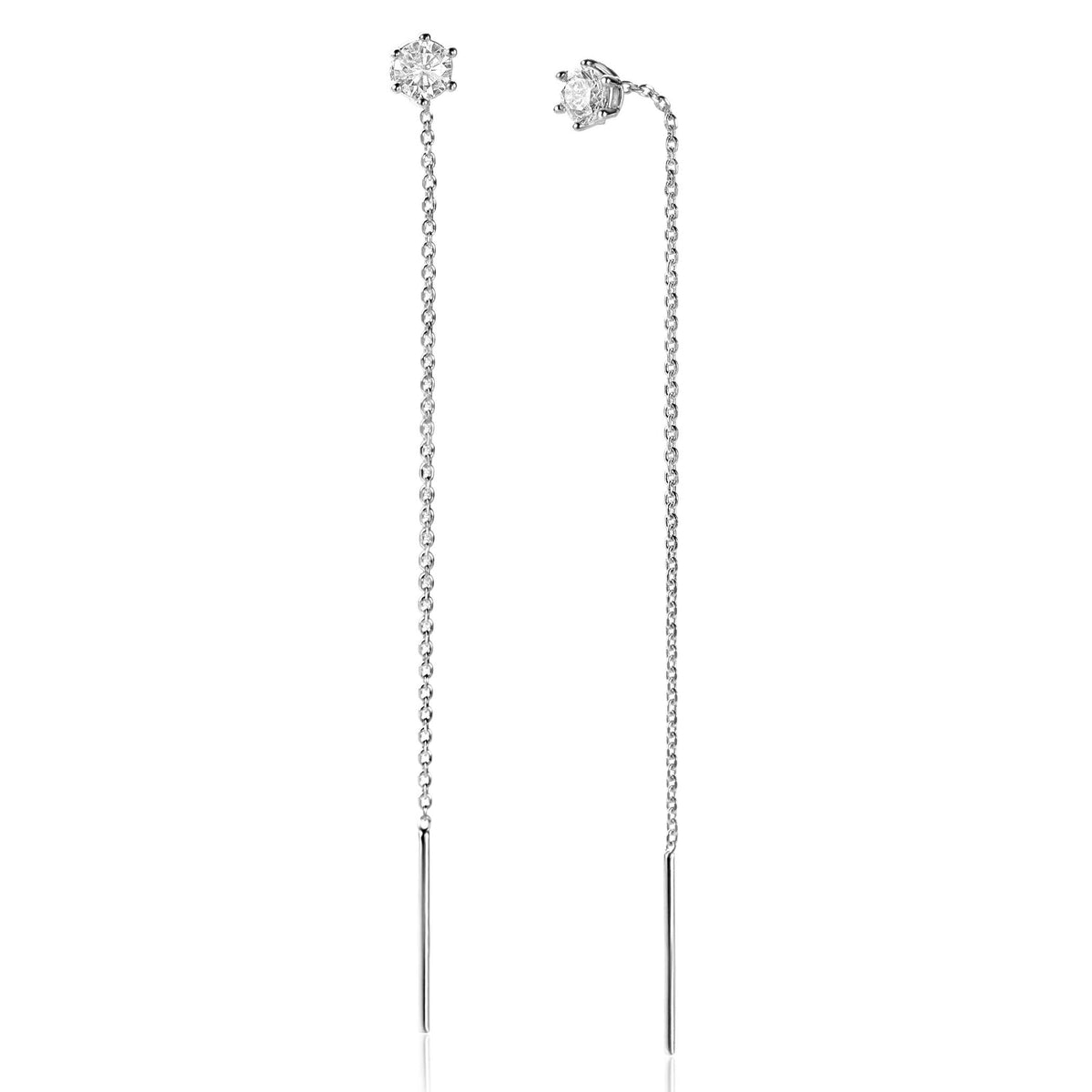 Orecchini in argento con catena lunga e pendente, decorati con un dettaglio floreale.