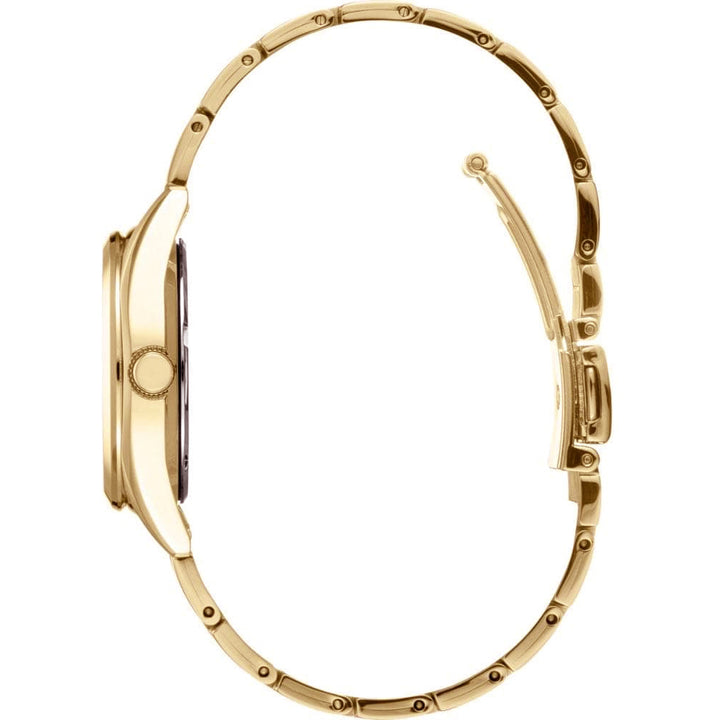 Zijaanzicht van het gestroomlijnde Seiko dameshorloge SUR632P1 met een slanke metalen band, die de dunheid en sluiting benadrukt. Dit gouden horloge is voorzien van saffierglas en is waterdicht tot 10 ATM, wat de elegantie verbetert en de nadruk legt op het verfijnde ontwerp door de wijzerplaat uit het zicht te houden.