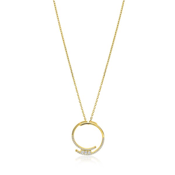 Collana in oro con pendente circolare e tre zirconi.
