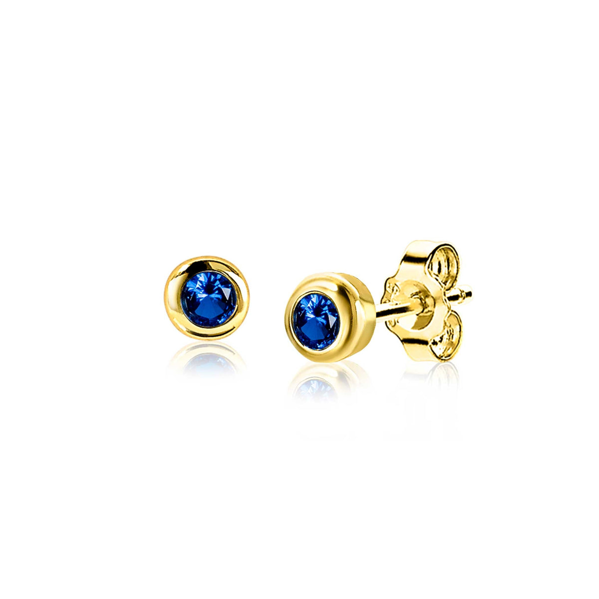Orecchini in oro giallo con pietra blu incastonata.