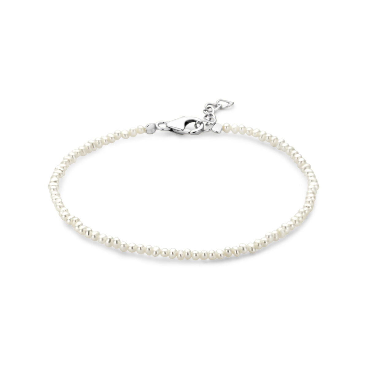 Bracciale in argento rodiato con perle bianche, lunghezza 16,5 + 2 cm.