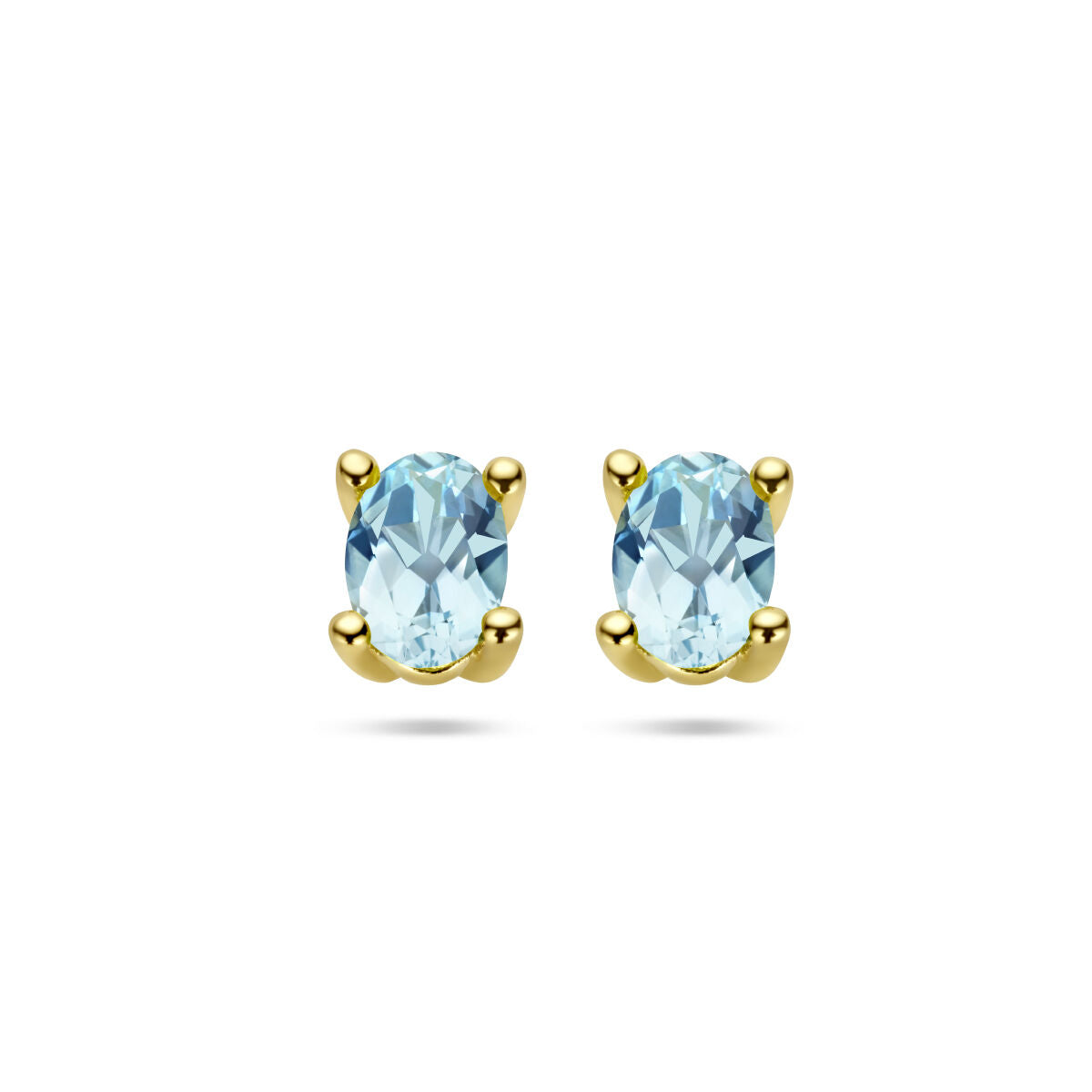 Orecchini in oro giallo 14K con topazi blu ovali.