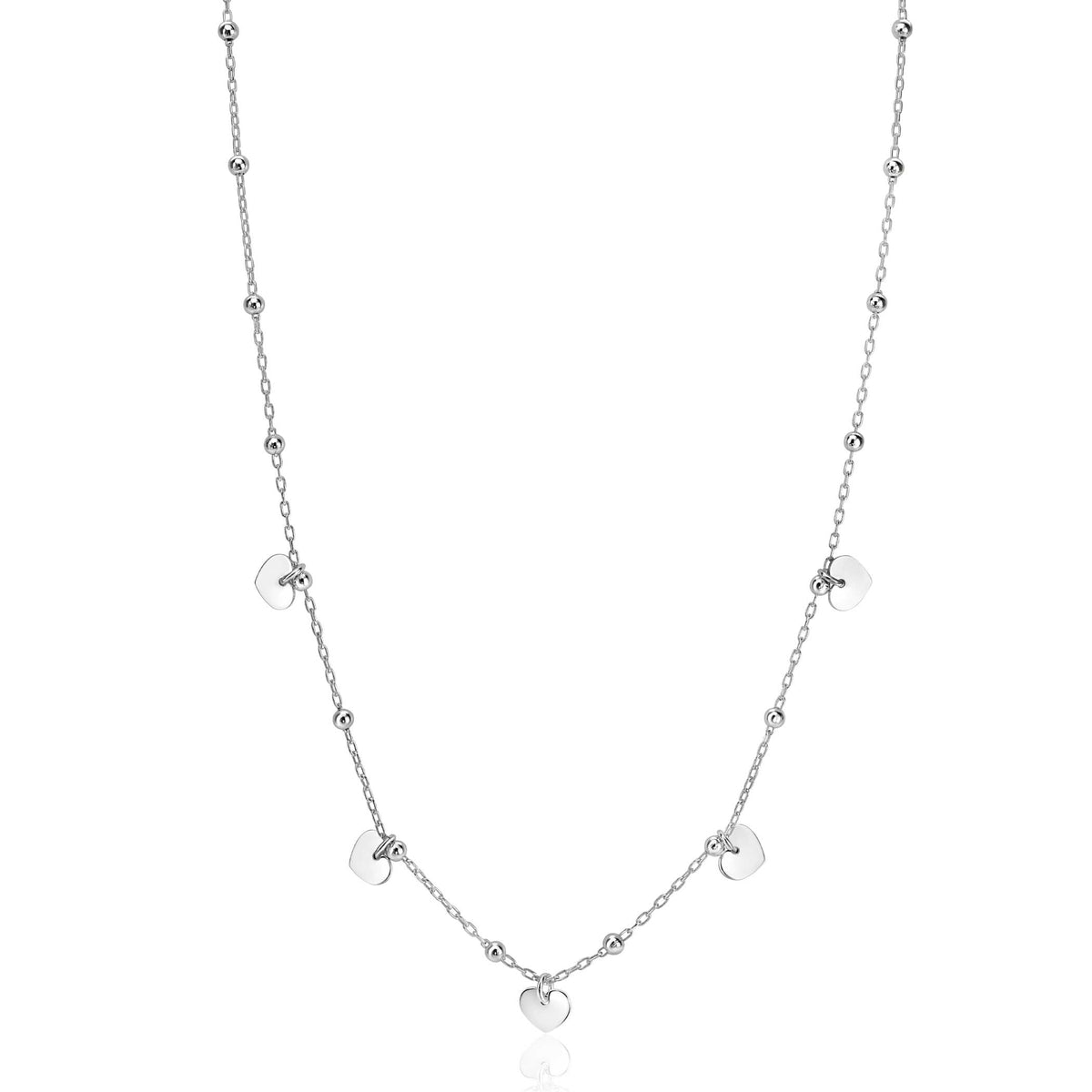 Collana in argento con pendenti a forma di cuore e piccole sfere.