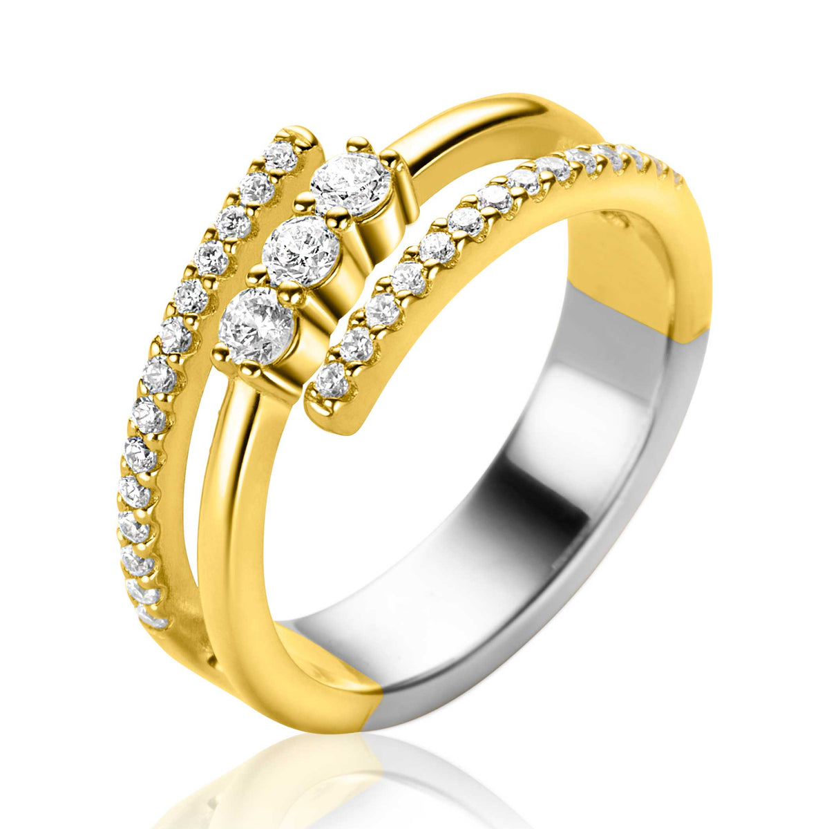 Anello in argento con dettagli dorati e tre zirconi brillanti.