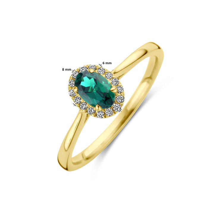 De Van der Kooij Collectie ring lab grown smaragd en diamant 0,075ct h si halo in 14K geelgoud heeft een ovale lab grown smaragd (8x6 mm), omringd door kleine lab grown diamanten op een fijne gouden band.