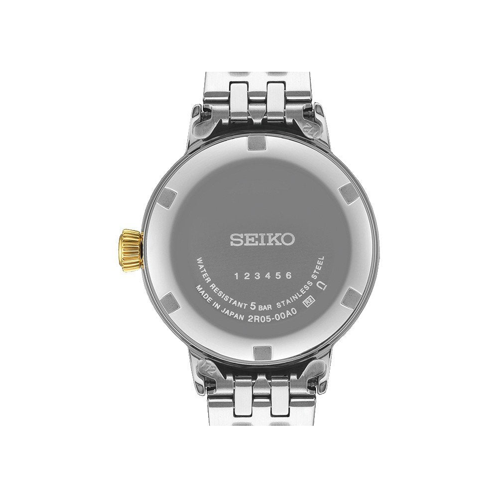 Achteraanzicht van het Seiko Presage dames horloge SRE010J1 van Seiko, met een metalen band, gegraveerde details, waterbestendigheid en een goudkleurige kroon - ideaal voor wie op zoek is naar een elegant en automatisch waterdicht horloge.