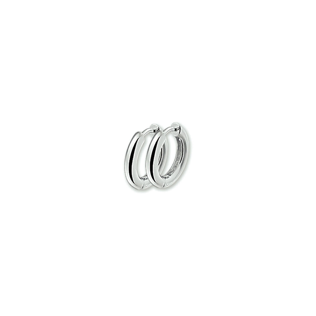 Orecchini alla creola con forma bombata in argento lucido.