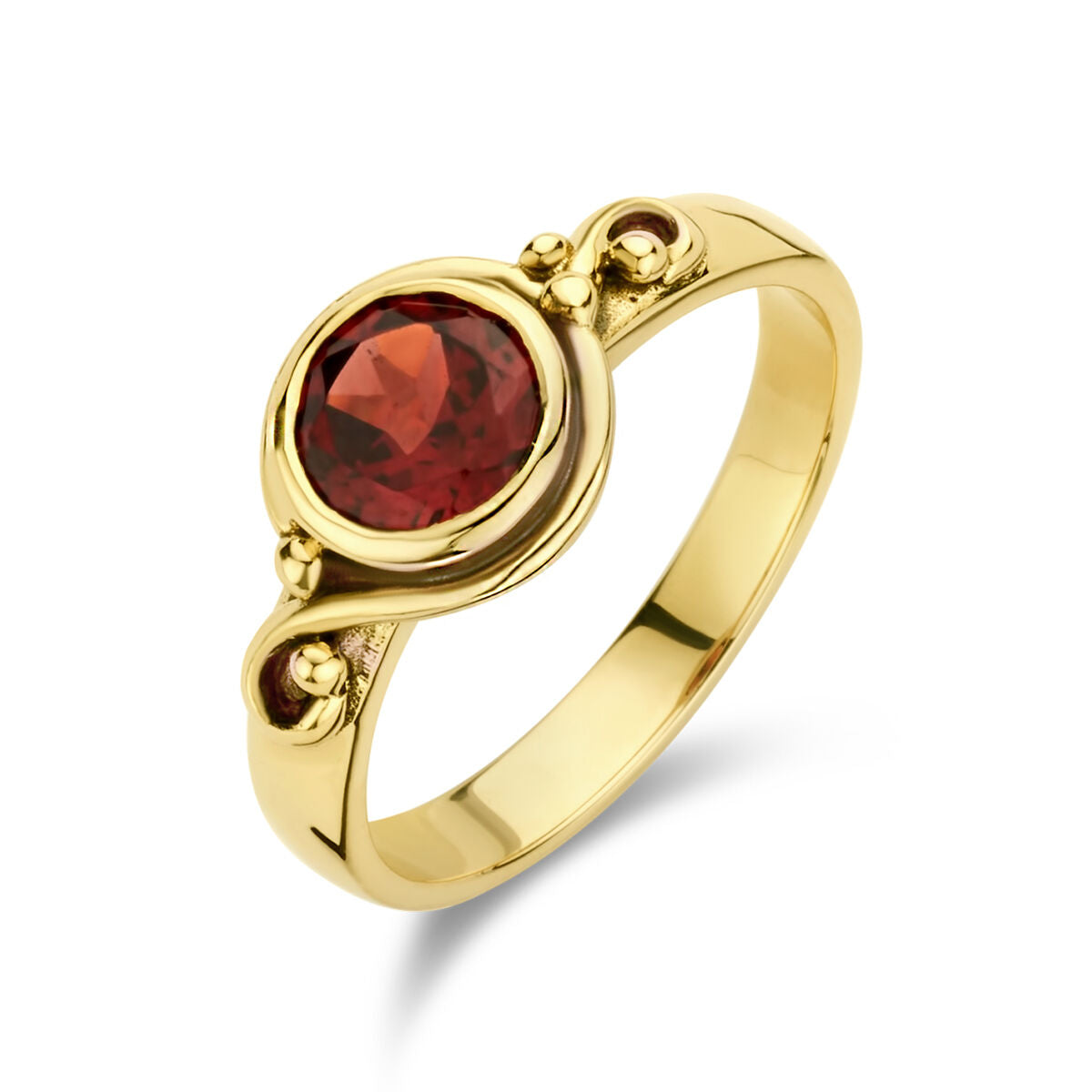 Anello vintage in oro giallo 14K con granato rosso e dettagli bombati.