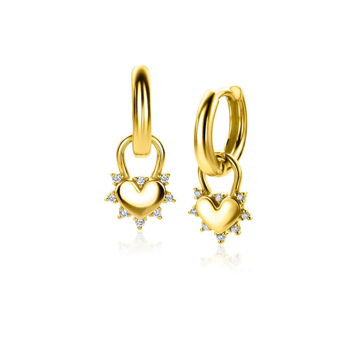 Orecchini in oro con pendente a forma di cuore e dettagli brillanti.