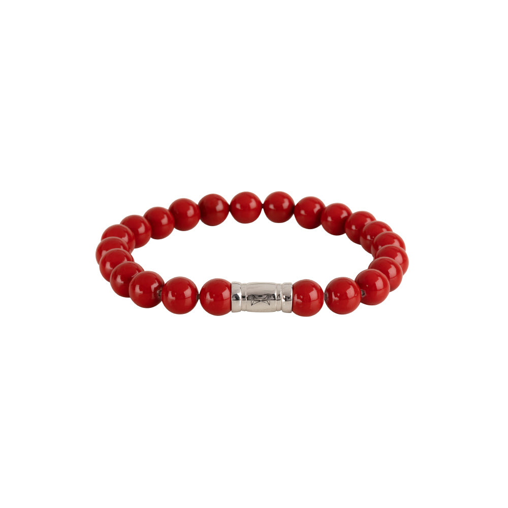 Bracciale di perline rosse in ardesia, con elementi metallici argentati.