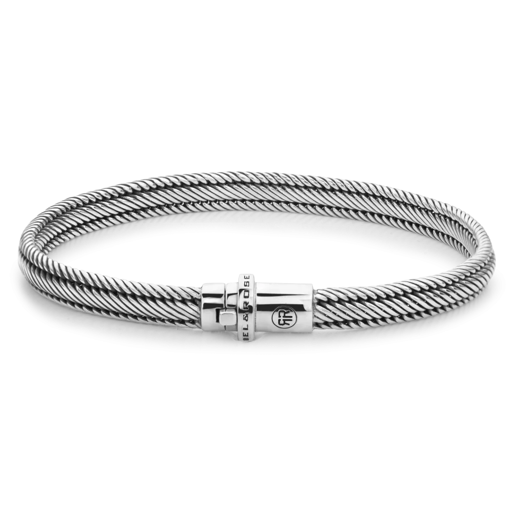 Bracciale in argento 925 con design a treccia e chiusura elegante.