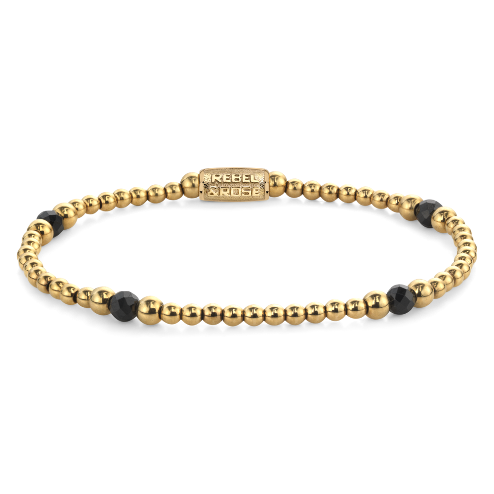 Bracciale da donna in oro con perline nere e dorate, design semplice e moderno.