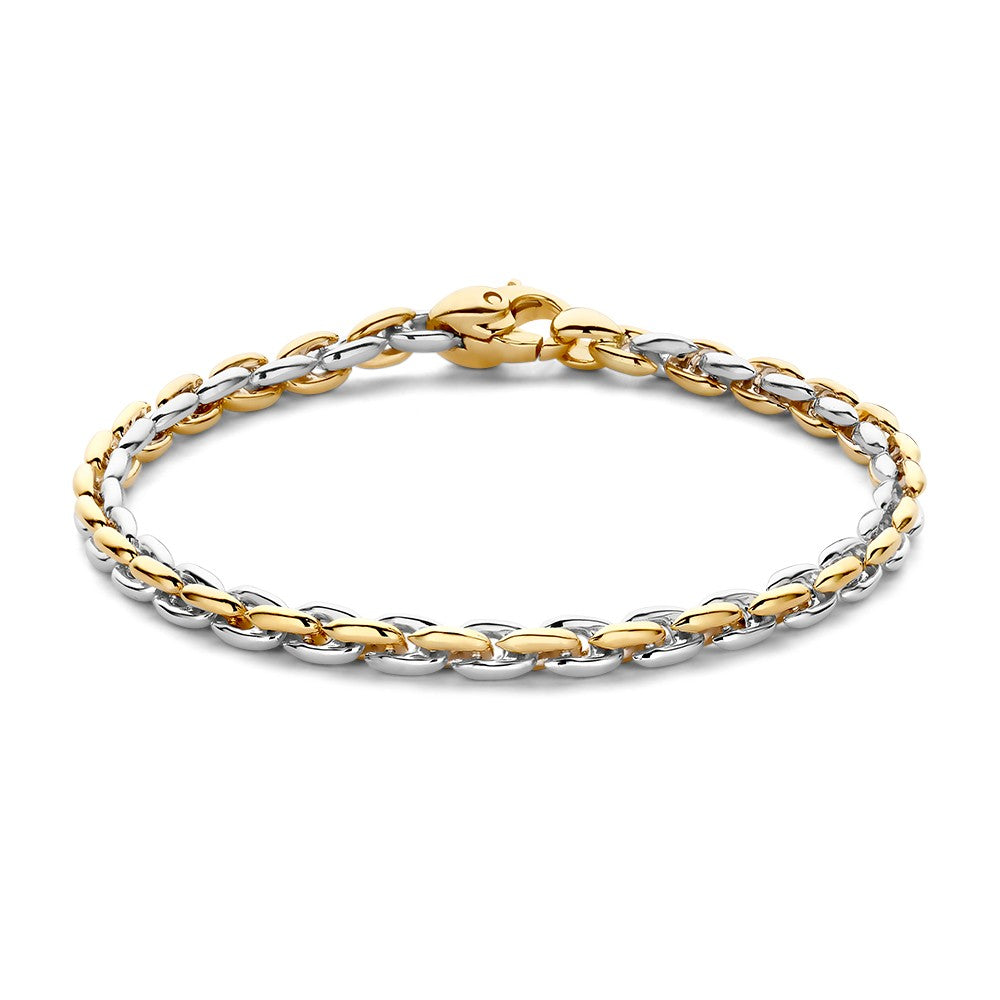 Bracciale bicolore con maglia intrecciata in oro e argento.