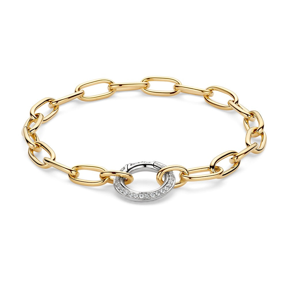 Bracciale elegante in oro giallo con chiusura a molla in oro bianco e diamanti.