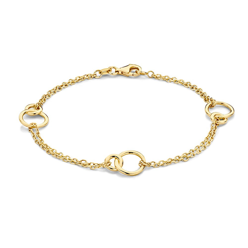 Bracciale in oro giallo con doppia fila e elementi circolari connessi.