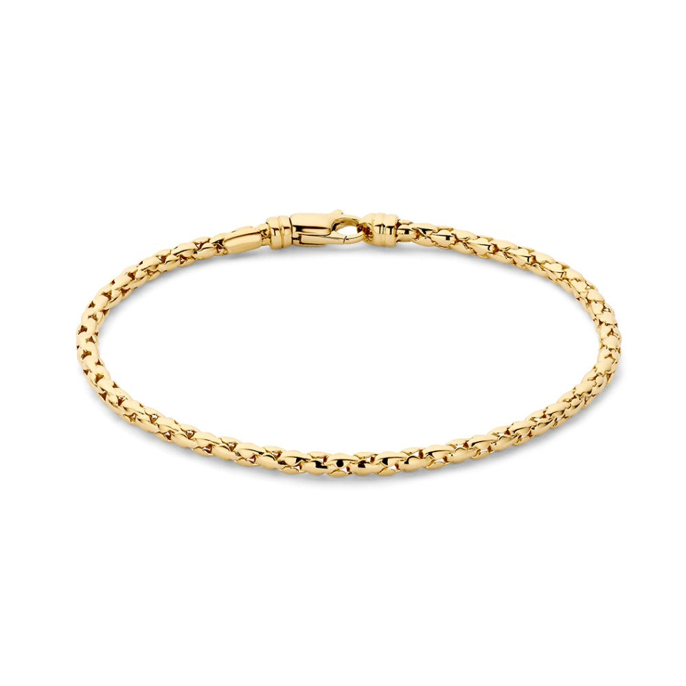 Bracciale in oro giallo con lavorazione intrecciata.