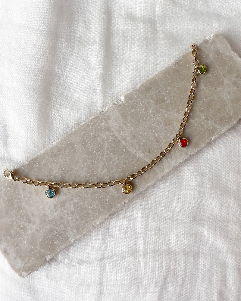 Bracciale in Oro Giallo con Charm di Pietre Preziose – Oro 14 Carati – Topazio Blu, Peridoto, Quarzo Limone e Opale di Fuoco