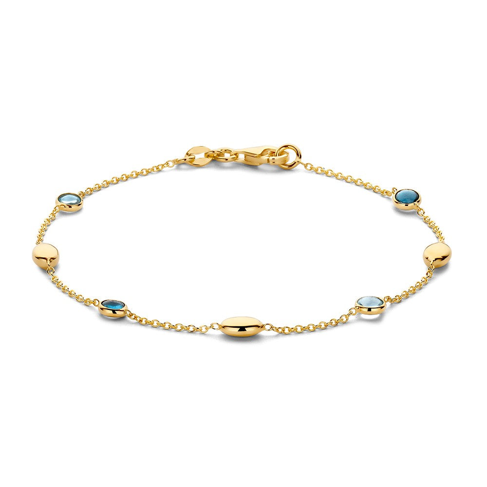 Bracciale in oro giallo con topazi blu, lunghezza 19 cm, con dettagli ovali e rotondi.