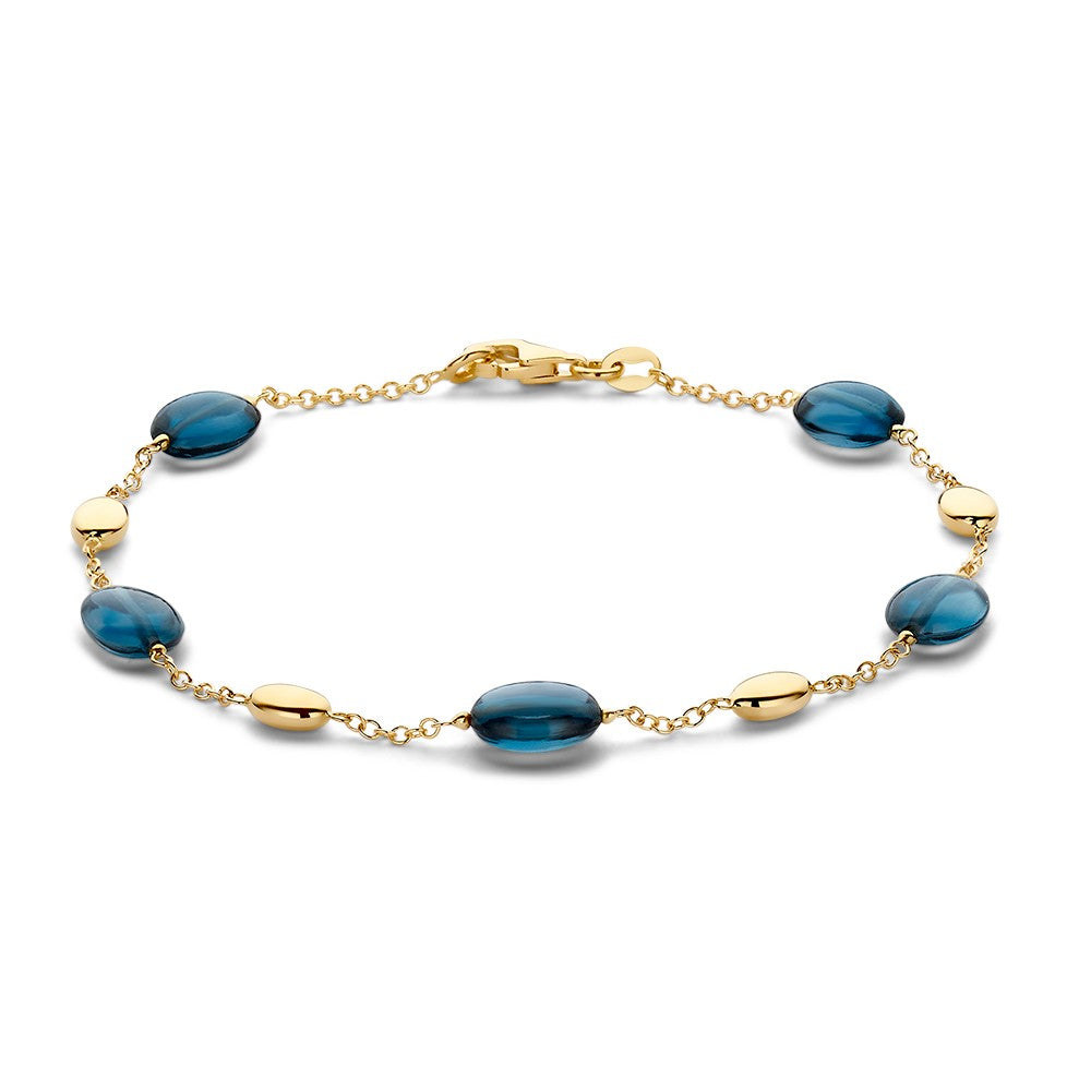 Bracciale in oro giallo con topazi blu, lunghezza 19 cm, larghezza 7 mm.