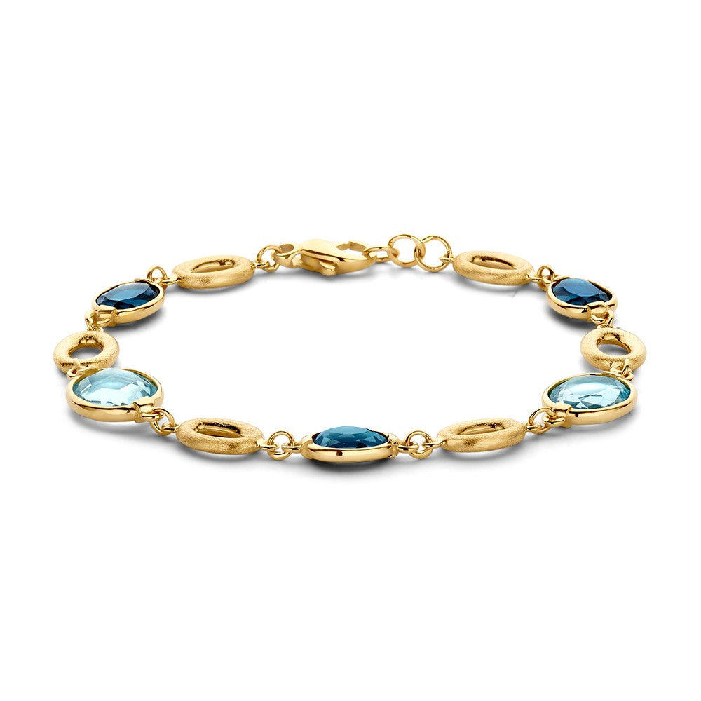 Bracciale in oro giallo con pietre preziose blu e azzurre, forma ovale.