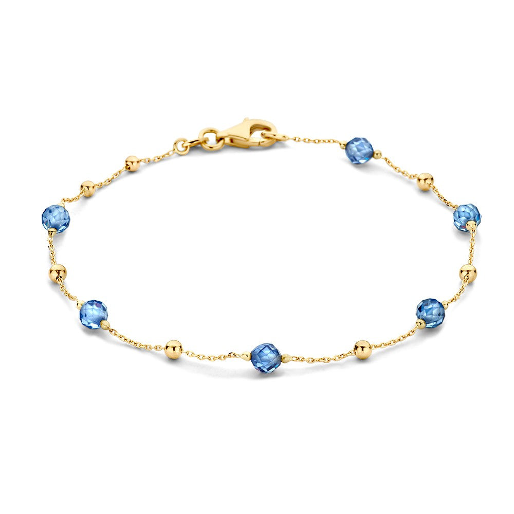 Bracciale in oro giallo con palline di zirconia blu scuro, lunghezza 19 cm.