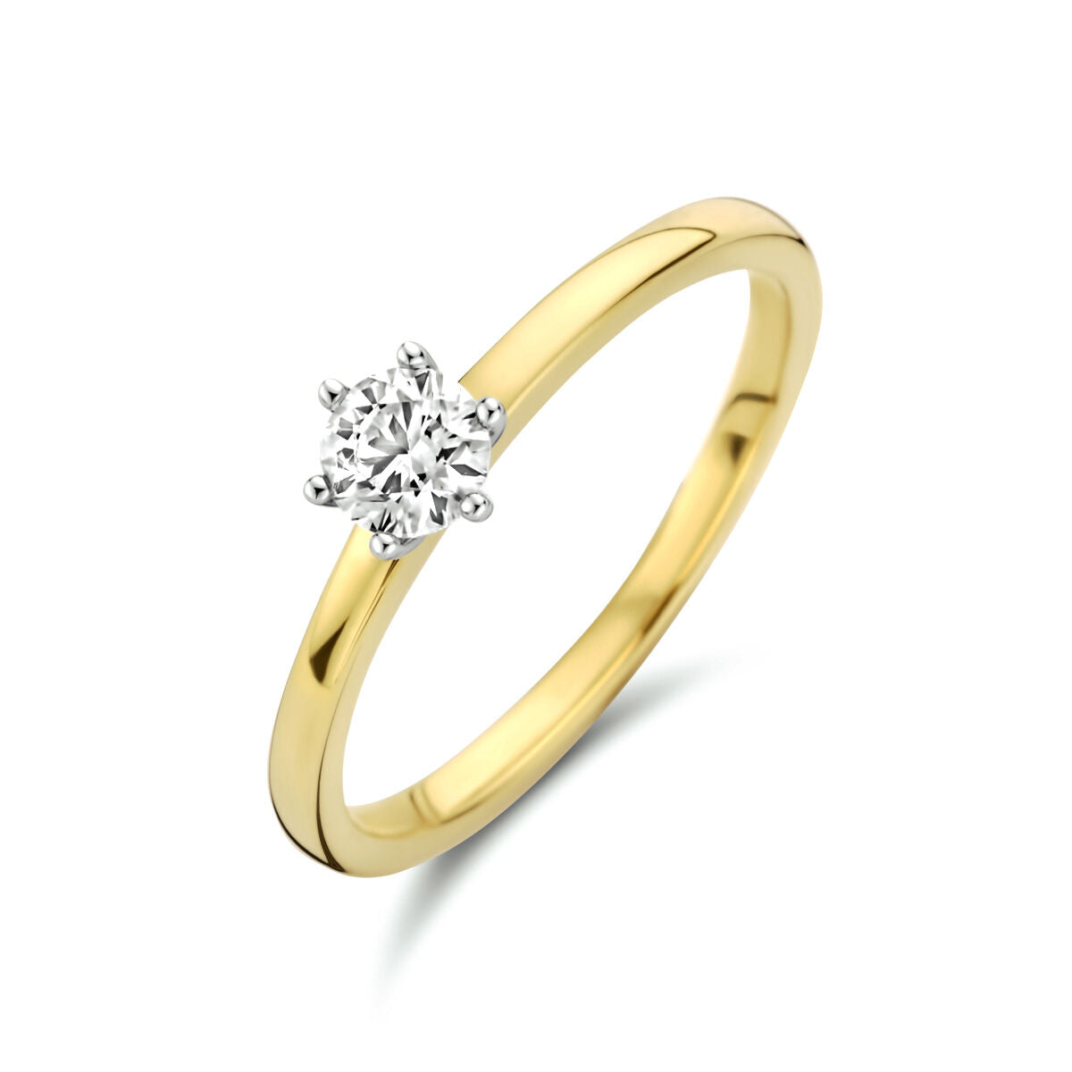Anello in oro bicolore giallo e bianco con diamante di 0,25 ct.