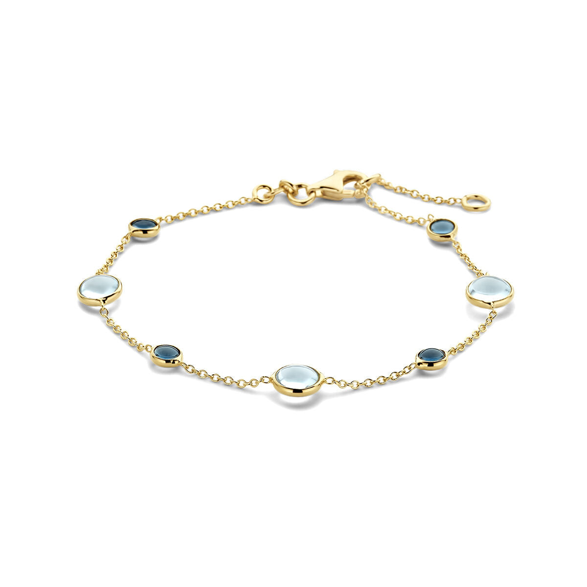Bracciale in oro 14K con topazi blu e topazi London blue, con pietre ovali incastonate.