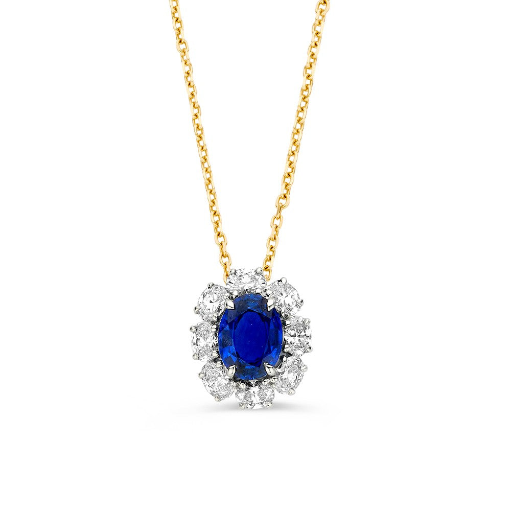 Collana bicolore con zaffiro e diamanti, pendente ovale incastonato in oro giallo e bianco.