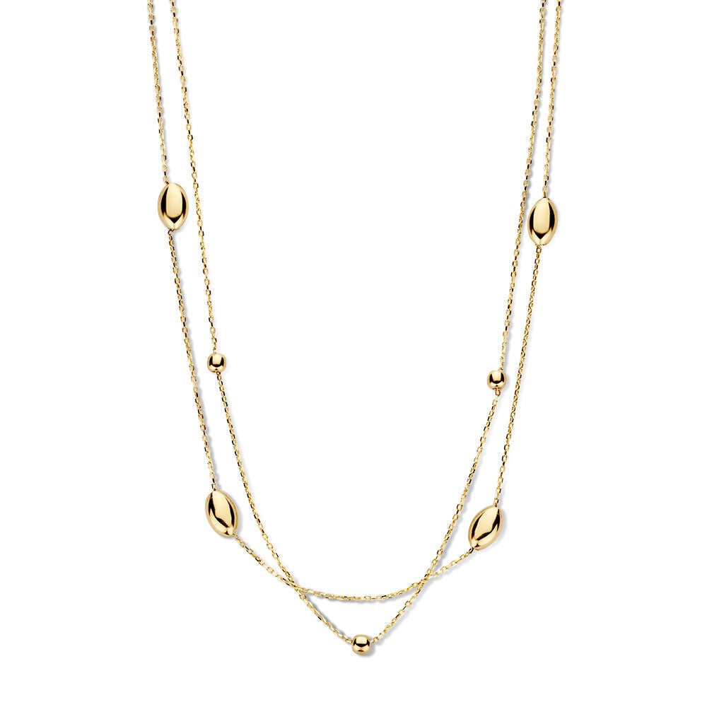Collana in oro giallo con elementi dorati, caratterizzata da una doppia catena e dettagli ovali.