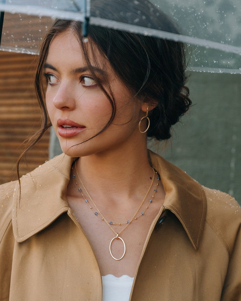 Collana in oro giallo con palline in oro e zirconia blu - 14 carati