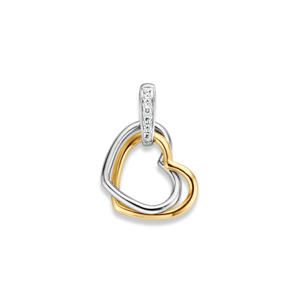 Ciondolo a forma di cuore bicolore in oro giallo e bianco con zircone.