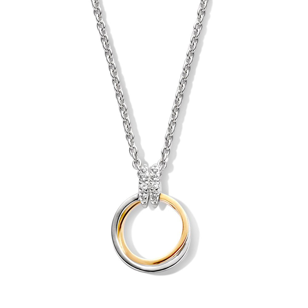 Ciondolo argento con anello dorato e zircone bianche, diametro 20 mm.