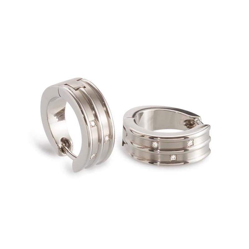 Orecchini in titanio con design a bande e dettagli lucidi, diametro 6 mm.