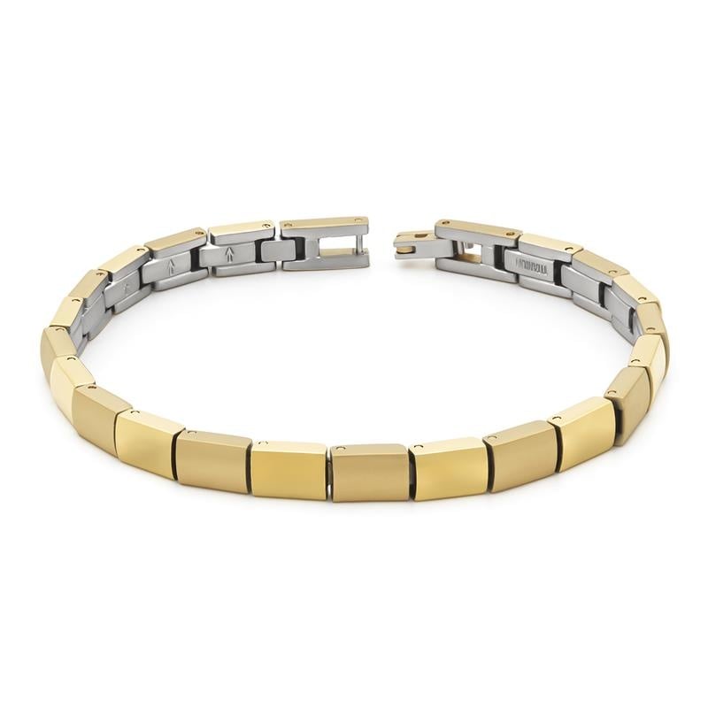 Bracciale in titanio con elementi dorati e argentati, design moderno e geometrico.