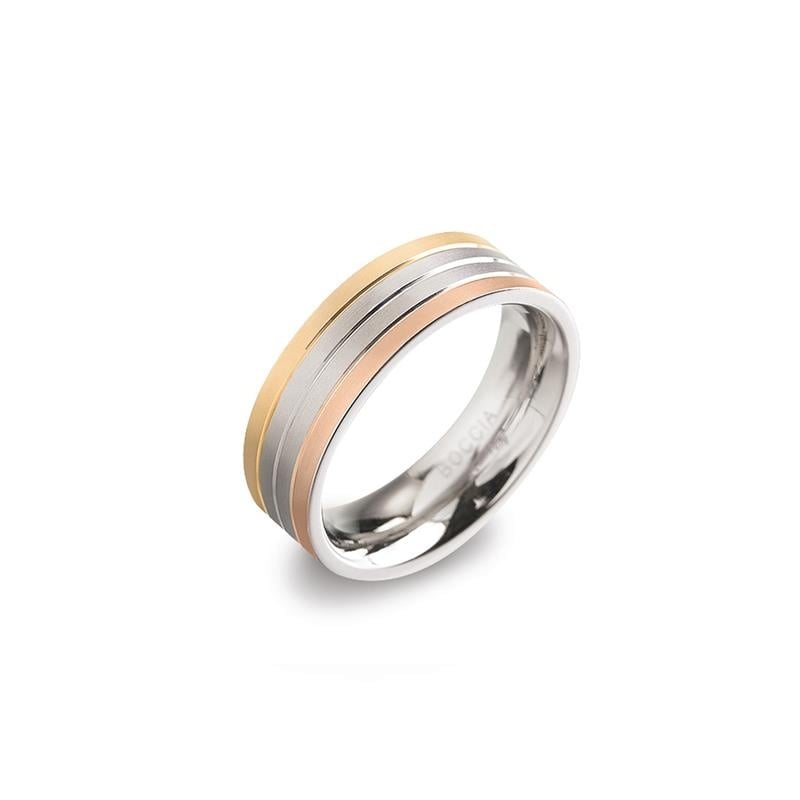 Anello in titanio tricolore con fasce argentate, dorate e rosate.
